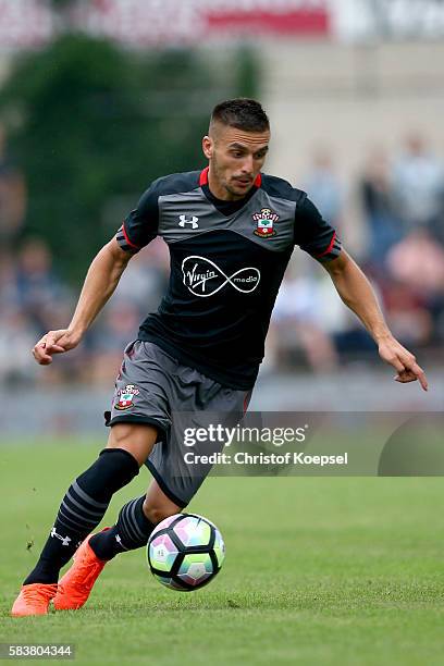 Dusan Tadic of Southampton runs with the ball during the friendly match between Twente Enschede and FC Southampton at Q20 Stadium on July 27, 2016 in...