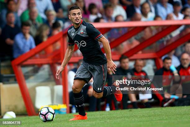 Dusan Tadic of Southampton runs with the ball during the friendly match between Twente Enschede and FC Southampton at Q20 Stadium on July 27, 2016 in...