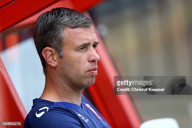 Head coach Rene Hake of Enschede sits on the bench during the friendly match between Twente Enschede and FC Southampton at Q20 Stadium on July 27,...