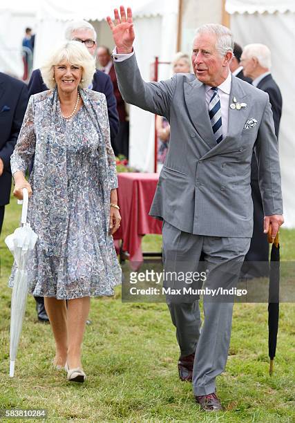 Prince Charles, Prince of Wales and Camilla, Duchess of Cornwall visit the Sandringham Flower Show at Sandringham House on July 27, 2016 in King's...