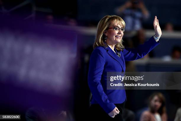 Former Congresswoman Gabby Giffords waves to the crowd on the third day of the Democratic National Convention at the Wells Fargo Center, July 27,...
