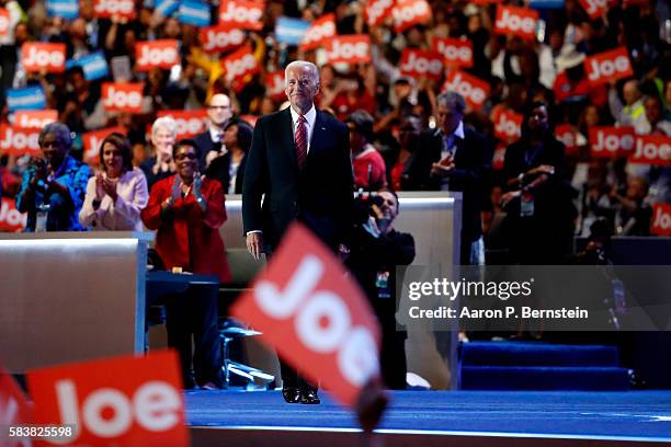 Vice President Joe Biden arrives on stage to deliver remarks on the third day of the Democratic National Convention at the Wells Fargo Center, July...