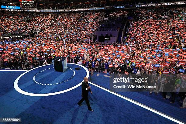 Vice President Joe Biden waves to the crowd as he arrives on stage to deliver remarks on the third day of the Democratic National Convention at the...