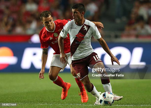 Torino's midfielder Iago Falque Silva with SL Benfica's defender from Spain Alex Grimaldo in action during the Eusebio Cup match between SL Benfica...