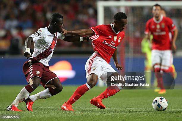Benfica's forward from Peru Andre Carrillo with Torino's midfielder Afriyie Acquah in action during the Eusebio Cup match between SL Benfica and...