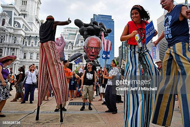 Bernie Sanders supporters gather near City Hall on day three of the Democratic National Convention on July 27, 2016 in Philadelphia, Pennsylvania....