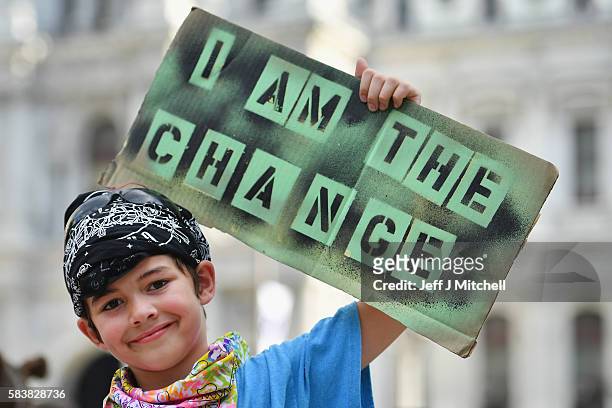 Children hold banners at a Bernie Sanders event near City Hall on day three of the Democratic National Convention on July 27, 2016 in Philadelphia,...