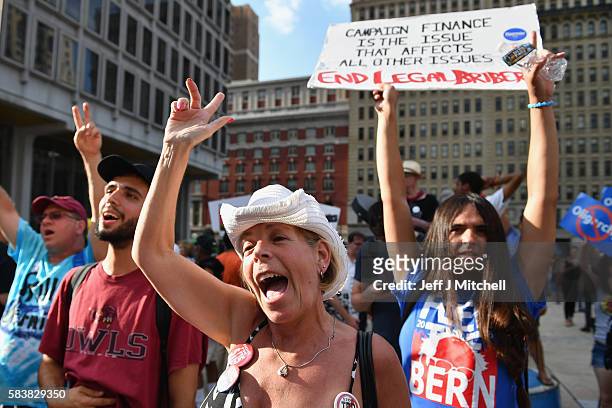 Bernie Sanders supporters gather near City Hall on day three of the Democratic National Convention on July 27, 2016 in Philadelphia, Pennsylvania....