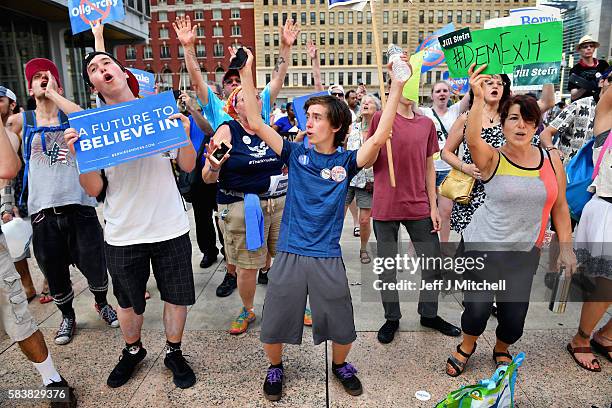 Bernie Sanders supporters gather near City Hall on day three of the Democratic National Convention on July 27, 2016 in Philadelphia, Pennsylvania....