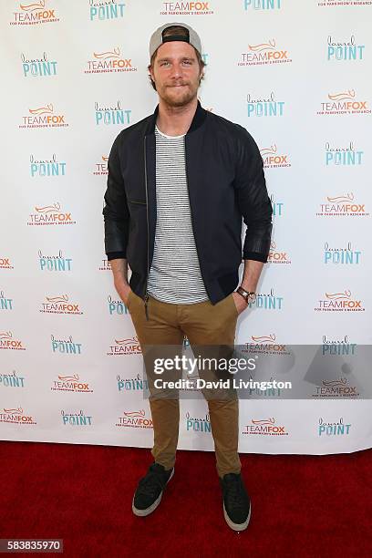 Actor Jake McDorman arrives at Raising The Bar To End Parkinson's at Laurel Point on July 27, 2016 in Studio City, California.