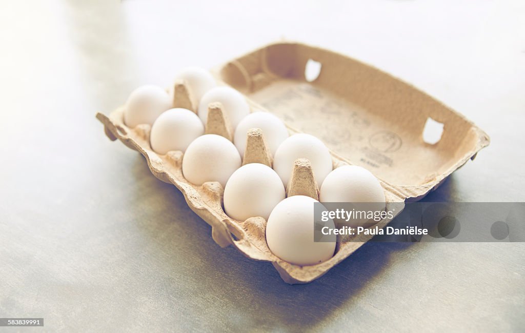 White eggs in cardboard box