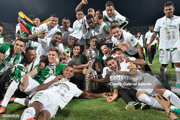 Players of Atletico Nacional celebrate the championship after a second leg final match between Atletico Nacional and Independiente del Valle as part...