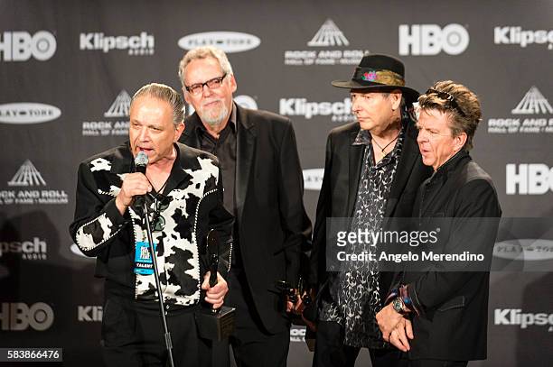 Jimmie Vaughn , Rreese Wynans , Tommy Shannon , and Chris Layton talk with reporters at the 30th Annual Rock 'n Roll Hall of Fame Induction Ceremony...
