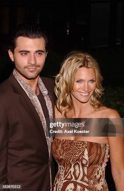 Actress Natasha Henstridge and Darius Danesh arrive to the Sheila and Lynn Marbry's Elevate Hope Foundation "Circle of Passion" pre-Oscar benefit...