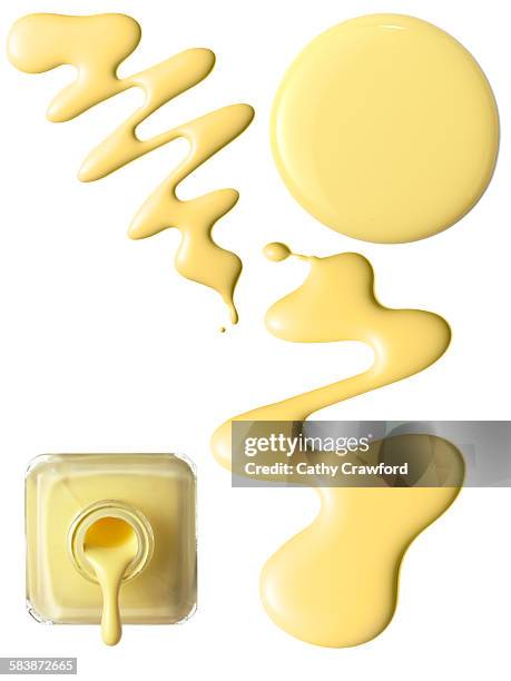 nail polish drip por and circle - yellow nail polish stock-fotos und bilder