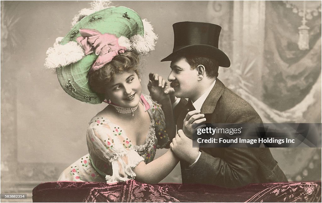 Victorian Couple in Big Hats