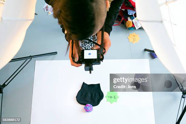 young woman photographing products - product photo shoot stock pictures, royalty-free photos & images