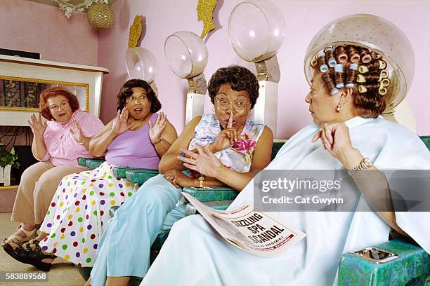 women gossiping at hair salon - scandal stockfoto's en -beelden