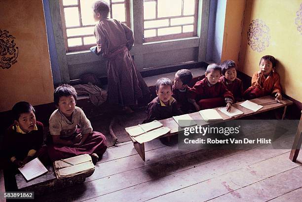 Classroom of young Buddhist monks-in-training at a Himalayan monastery in Sikkim, India.