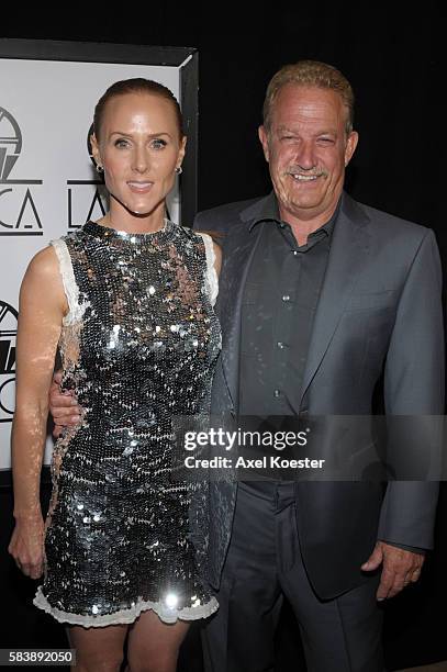 Sarah Siegel-Magness and Gary Magness, producer of Precious, arrive to the 35th Annual Los Angeles Film Critics Association Awards held at the Hotel...