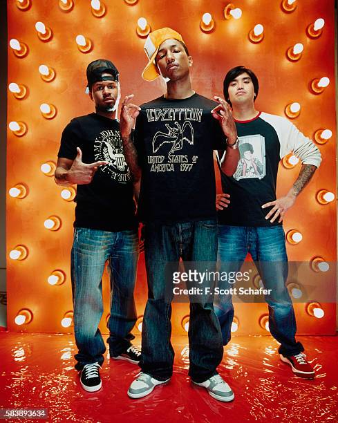 Sheldon Shay Haley, Pharrell Williams and Chad Hugo) are photographed for Request Magazine in 2002. COVER IMAGE.
