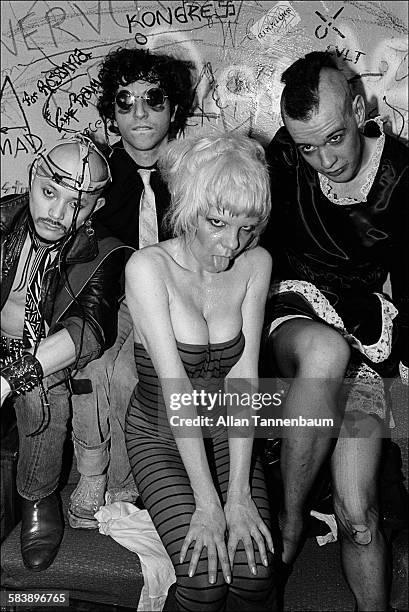 Portrait of American musician Wendy O Williams and her band the Plasmatics as they pose backstage at CBGB after a set, New York, New York, March 1,...