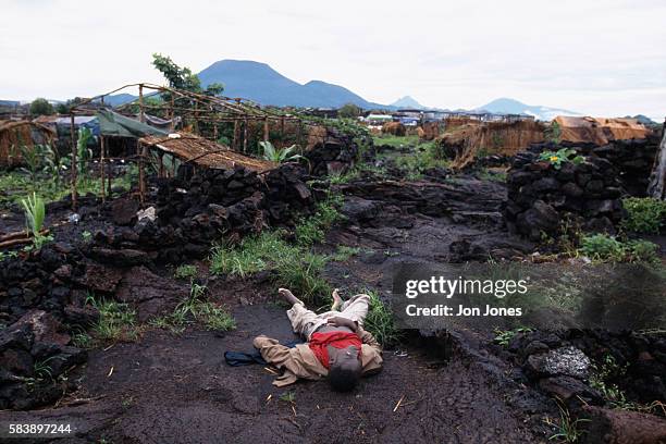 Dead body of massacred Rwandan refugee near Goma.