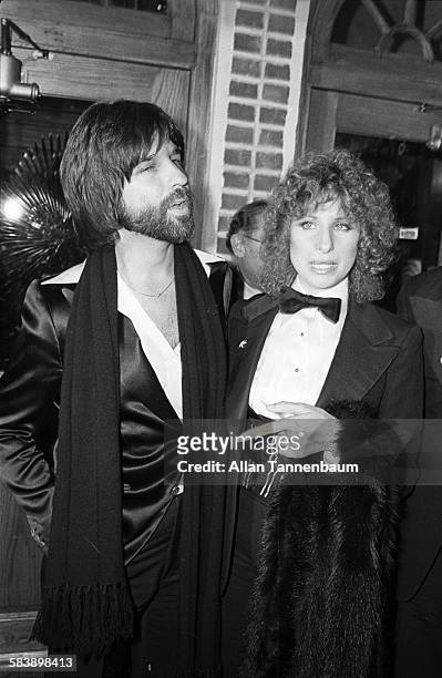 American producer Jon Peters and actress Barbra Streisand arrive for the premiere of their film 'A Star Is Born' at Tavern on the Green, New York,...