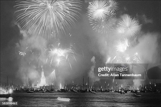 Fireworks fill the night sky over New York Harbor and the Statue of Liberty in celebration of America's Bicentennial, New York, New York, July 4,...
