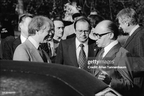 President Jimmy Carter and Israeli Prime Minister Menachem Begin say good-bye after a meeting at the White House, New York, New York, December 16,...