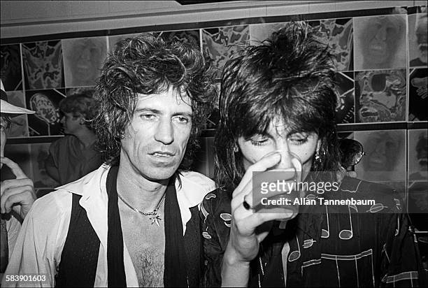 British musicians Keith Richards and Ron Wood, of the group the Rolling Stones, visit Danceteria, New York, New York, June 26, 1980. The band was...