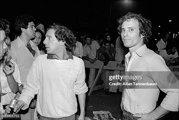Outside Studio 54, owners Steve Rubell and Ian Schrager check out would-be clubgoers, New York, New York, July 20, 1978.
