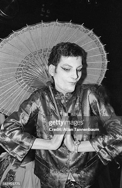 Portrait of American journalist Michael Musto, in face paint and Japanese-styled clothing, attends the third annual Halloween party at Studio 54, New...