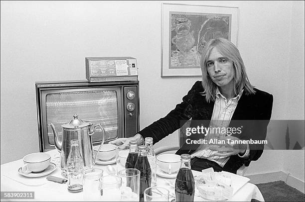 Portrait of American musician Tom Petty in his hotel room, New York, New York, October 7, 1977.