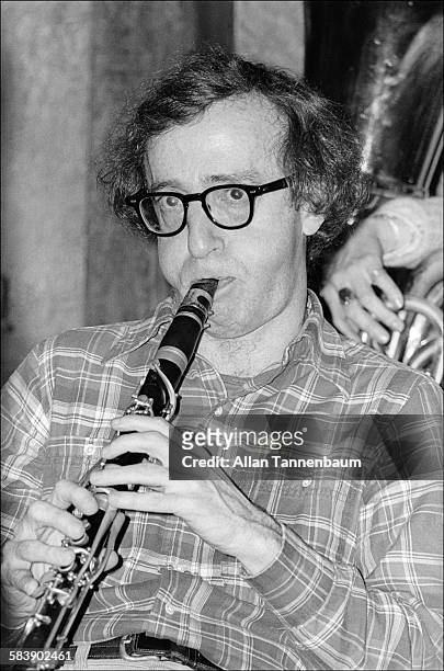 American film director and Jazz musician Woody Allen plays clarinet at Michael's Pub, New York, New York, April 3, 1973. The twin towers of the World...