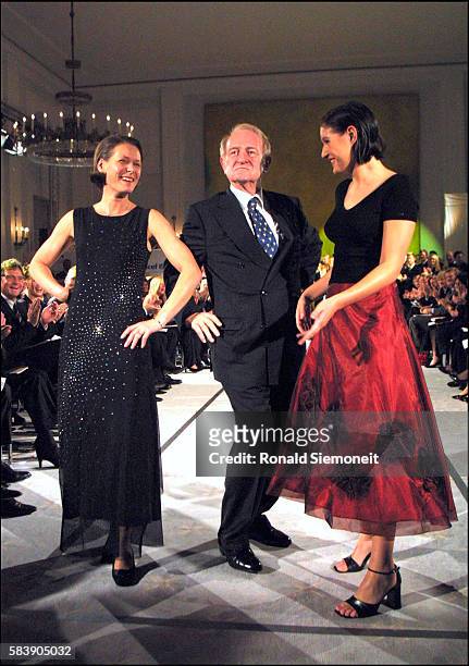 German President Johannes Rau joins his wife Christina and his daughter Anna Christina at a charity fashion show to benefit UNICEF.