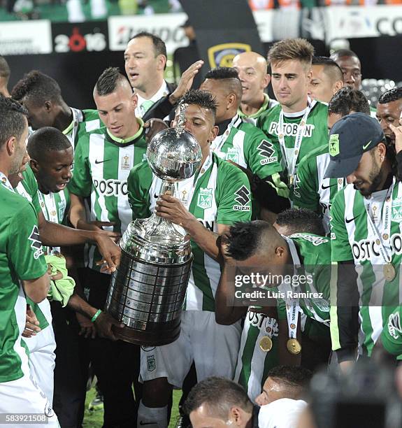 Players of Atletico Nacional celebrate their championship after winning the second leg final match between Atletico Nacional and Independiente del...