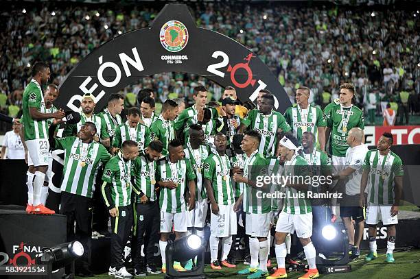 Players of Atletico Nacional celebrate their championship after winning the second leg final match between Atletico Nacional and Independiente del...