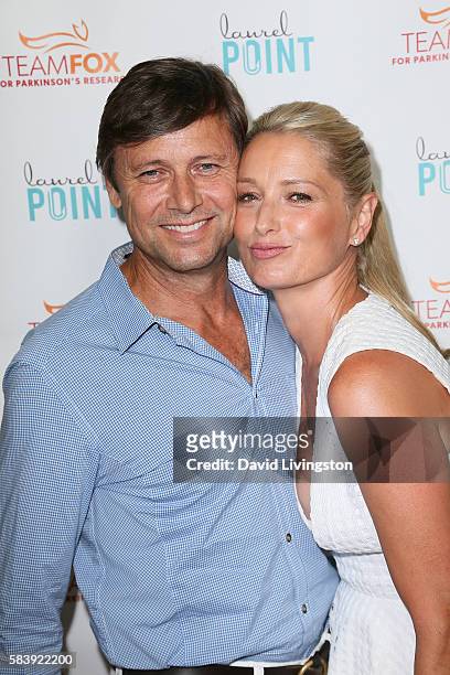 Grant Show and Katherine LaNasa arrive at Raising The Bar To End Parkinson's at Laurel Point on July 27, 2016 in Studio City, California.