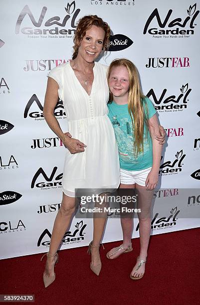 Robyn Lively arrives at the 10 Year Anniversary with Beauty for a Cause Summer Toy Drive at Nail Garden on July 26, 2016 in Studio City, California.