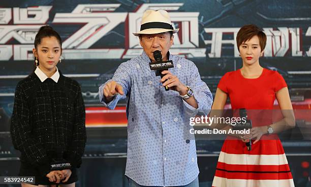 Nana Ouyang and Erica Xia-hou look on as Jackie Chan addresses media during a press conference and photocall for Bleeding Steel at Sydney Opera House...