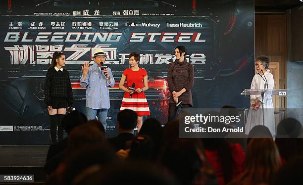 Nana Ouyang, Jackie Chan, Erica Xia-hou and Tess Haubrich look on as Lee Lin Chin addresses media during a press conference and photocall for...