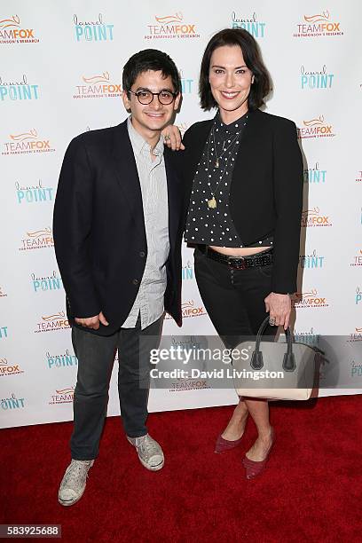 Actress Michelle Forbes and guest arrive at Raising The Bar To End Parkinson's at Laurel Point on July 27, 2016 in Studio City, California.