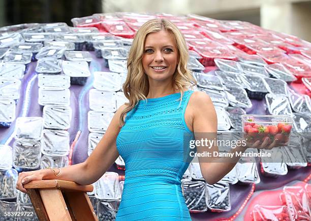 Television presenter Rachel Riley places the final home-grown strawberries on top of a giantmodel brain on July 28, 2016 in London, United Kingdom.