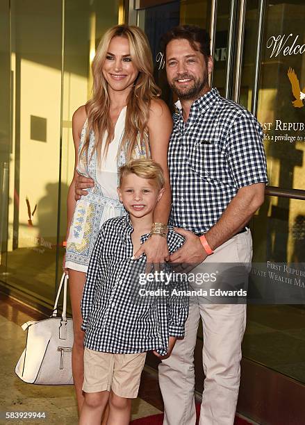 Actor Jason Priestley, his wife Naomi Lowde-Priestley and their son Dashiell Priestley arrive at the Raising The Bar To End Parkinson's event at...
