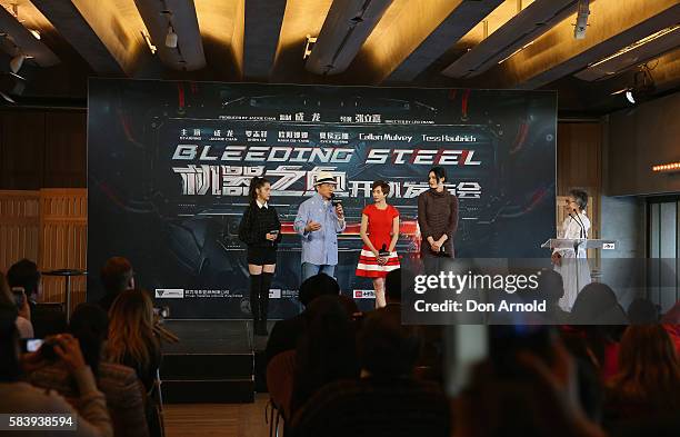 Nana Ouyang, Jackie Chan, Erica Xia-hou and Tess Haubrich look on as Lee Lin Chin addresses media during a press conference and photocall for...