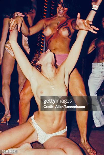 Nude women dance during a Purple Magazine party at Studio 54, New York, New York, September 15, 1977.