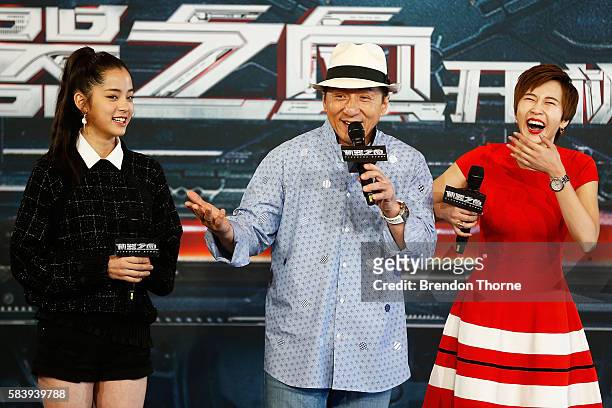 Nana Ouyang, Jackie Chan and Erica Xia-hou share a joke on stage during a press conference and photocall for Bleeding Steel at Sydney Opera House on...