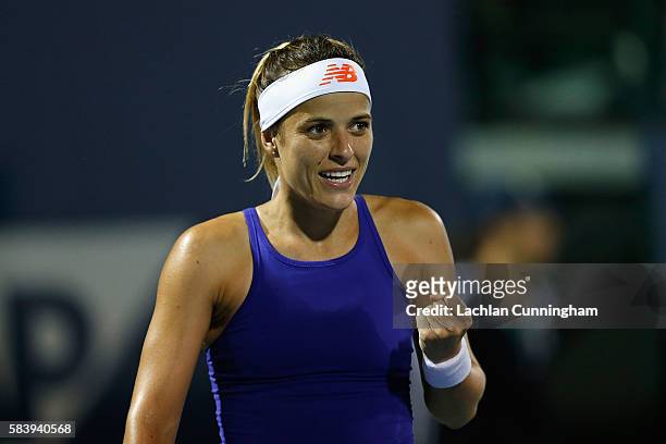 Nicole Gibbs of the United States celebrates a win against Carol Zhao of Canada during day one of the Bank of the West Classic at the Stanford...