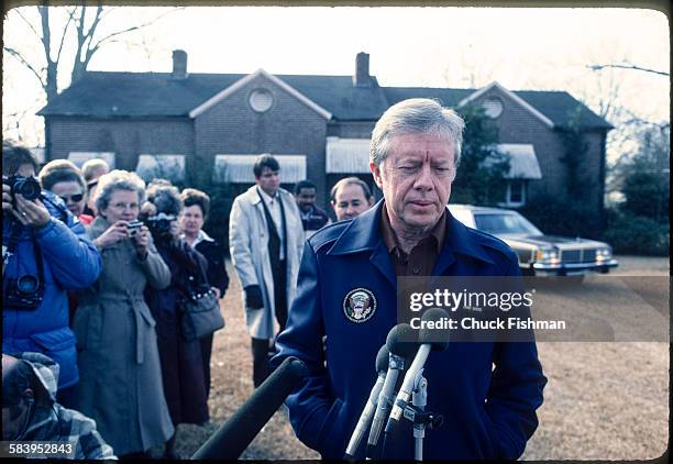Former president Jimmy Carter returns to his hometown of Plains, Georgia after his term as president ended and speaks to the press outside his home,...